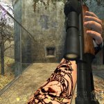 Tattooed_Arm_With_Diffrent_Gloves
