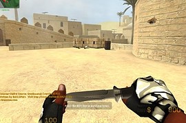 African_Hands_With_Camo_Gloves