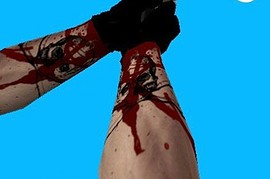 bloody hand with awsome tat